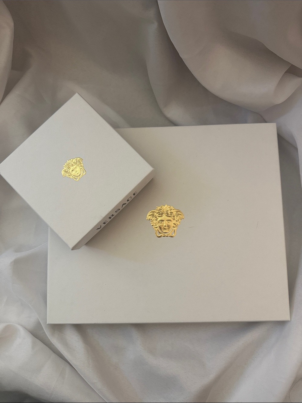 Versace White Boxes with Gold Medusa Accent